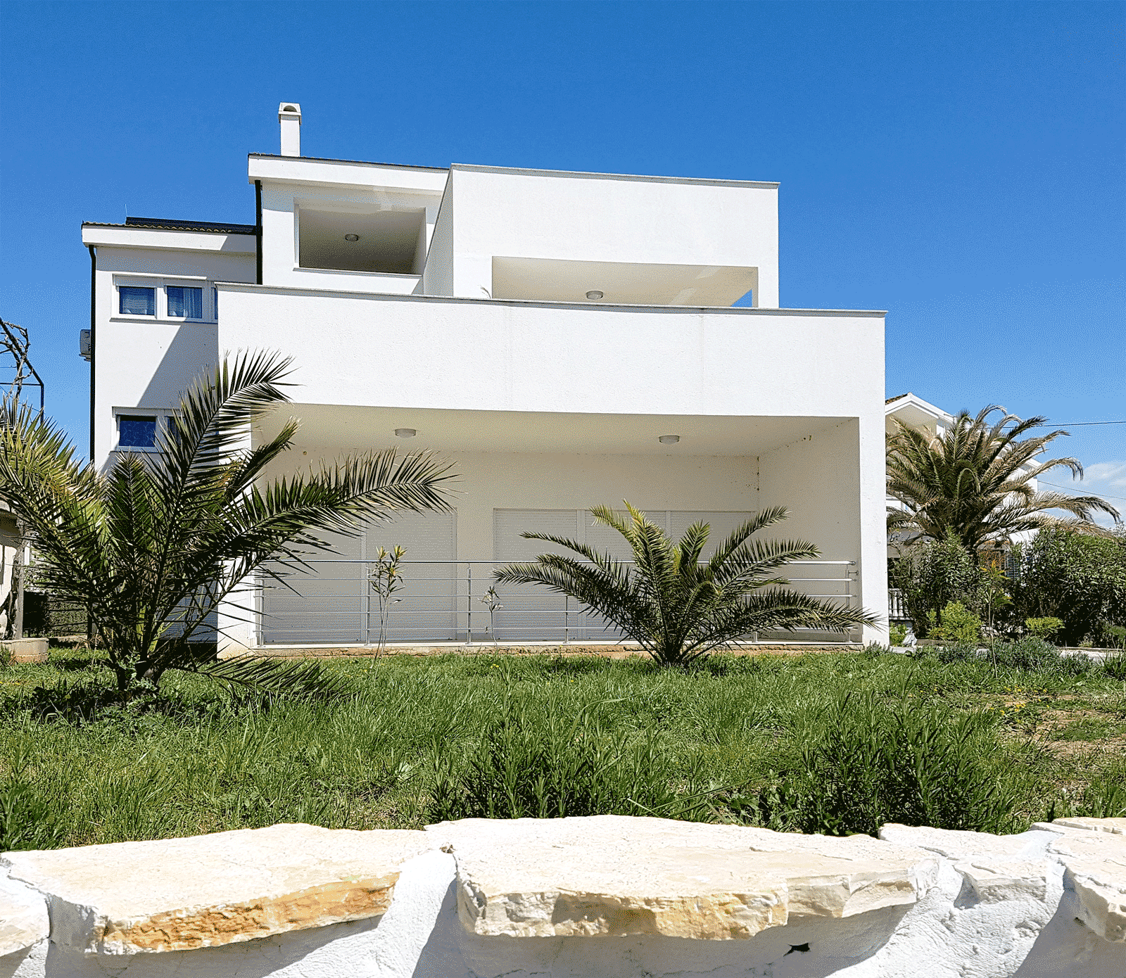 white residence luxury apartments exterior